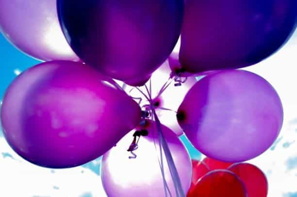 A bunch of purple balloons.