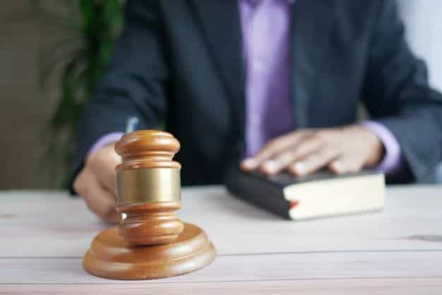 A judge holding a gavel.