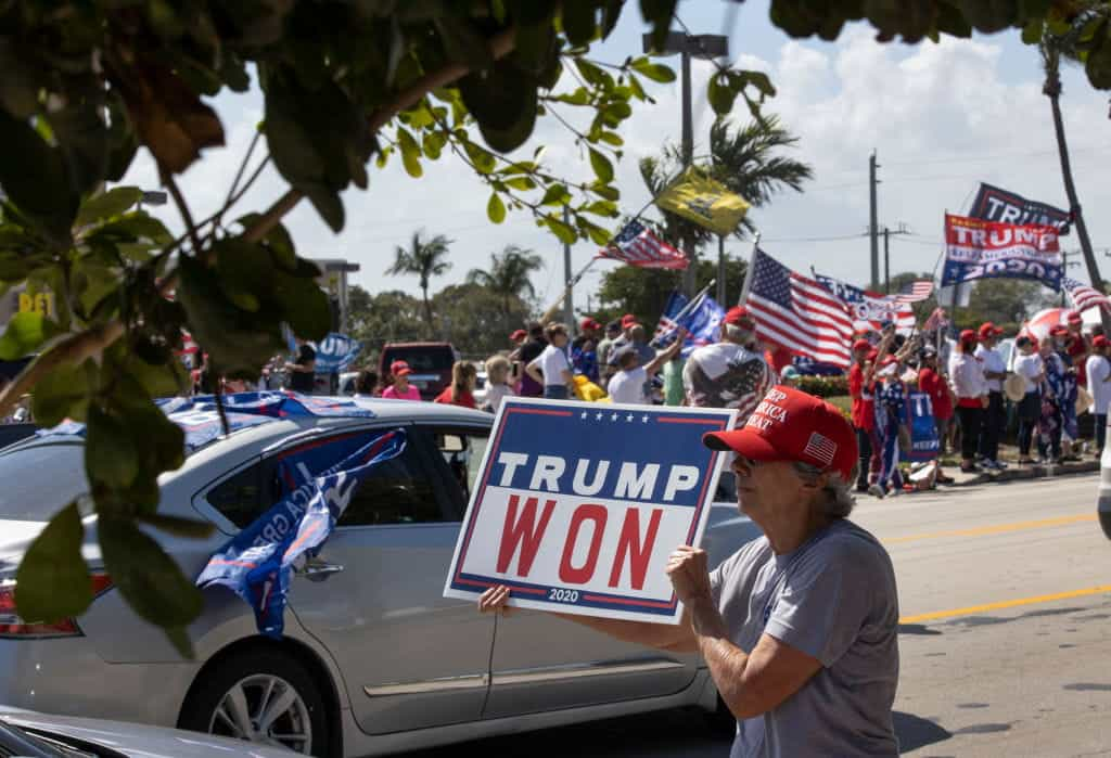 A Trump supporter protests her man won after the 2020 election result.