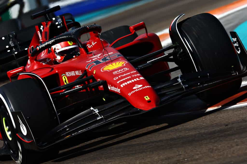 A Ferrari Formula 1 car streaking around the Miami’s street circuit.