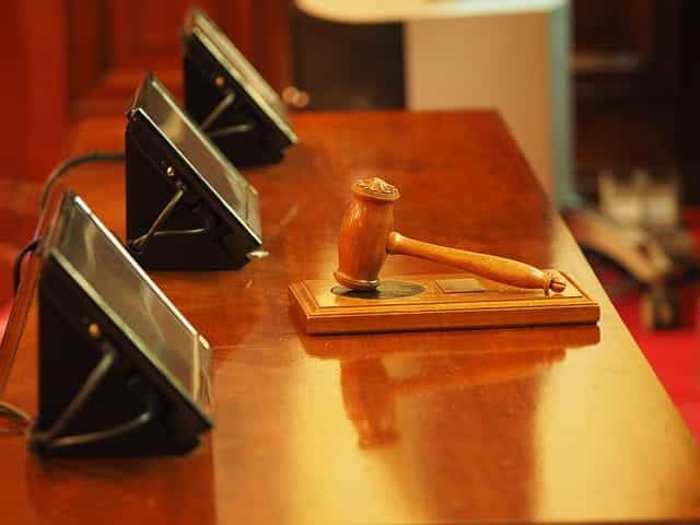 Courtroom desk and gavel.