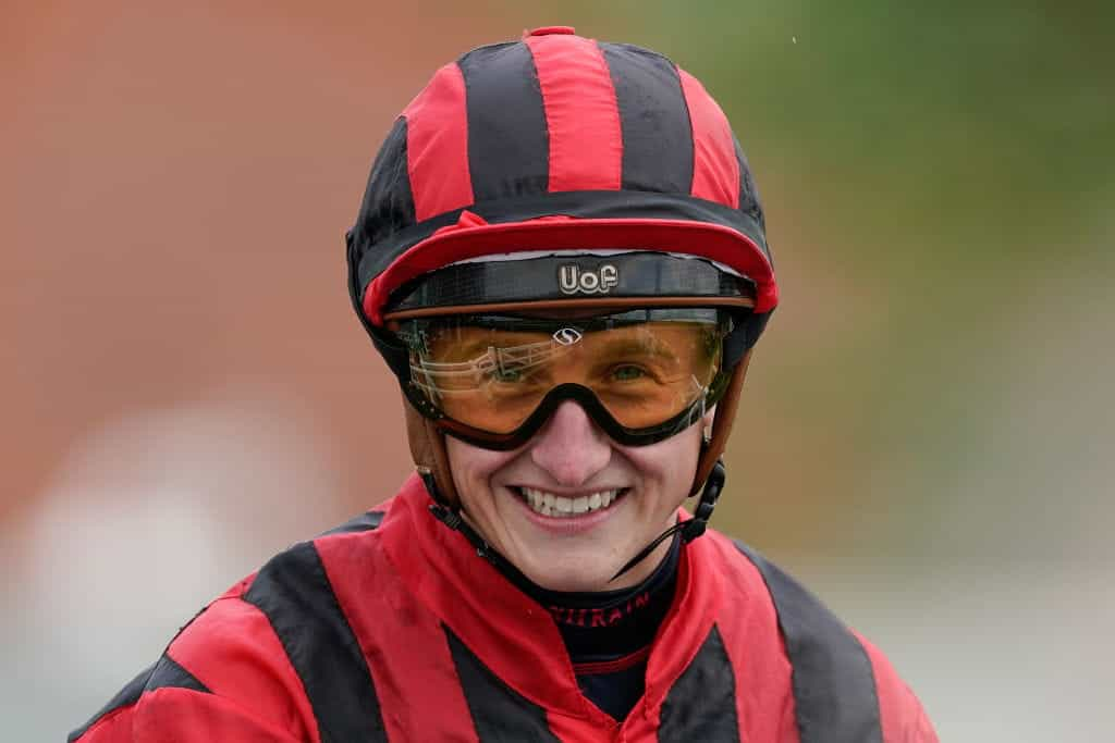 A close-up head shot of jockey, Tom Marquand.