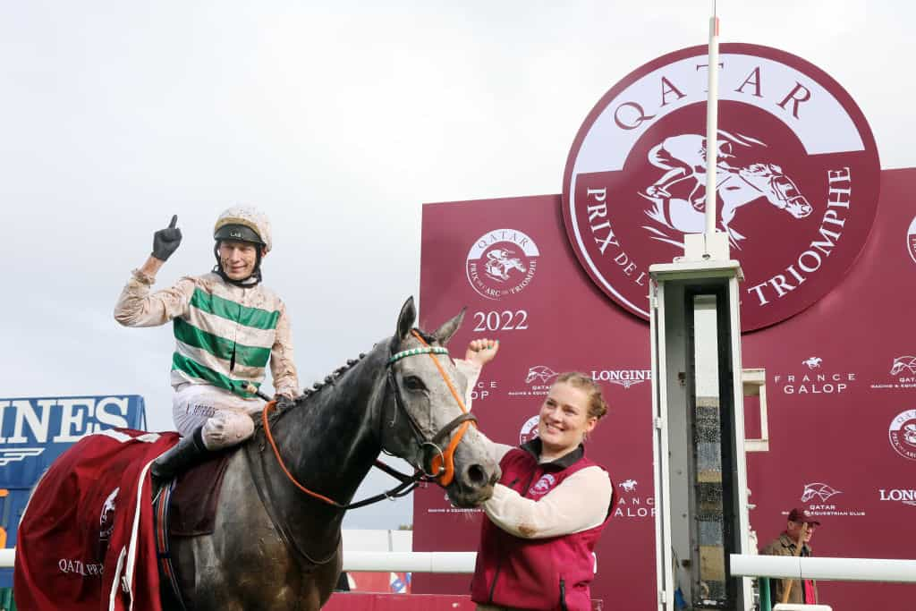 Luke Morris aboard Alpinista celebrates after winning the 2022 l’Arc de Triomphe.