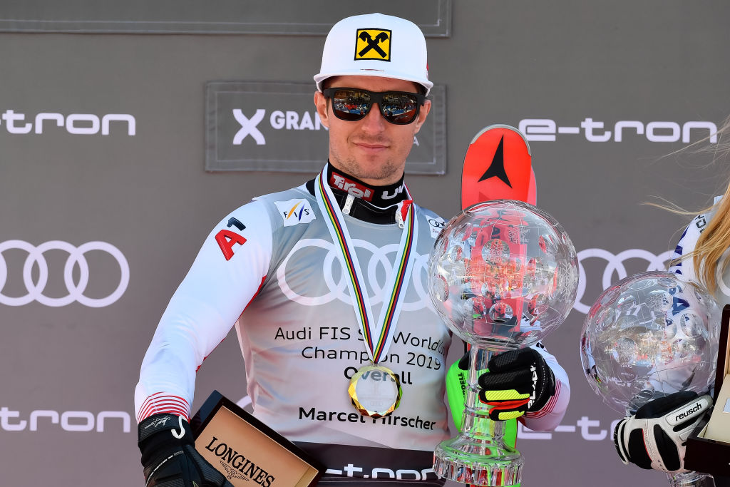 Marcel Hirscher collects his globe for winning the overall standings 2019 FIS Alpine Ski World Cup standings.